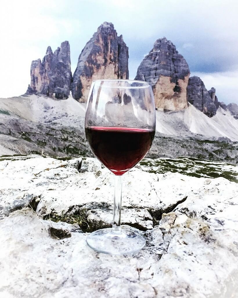 Glass of wine with Tre Cime di Lavaredo Panorama