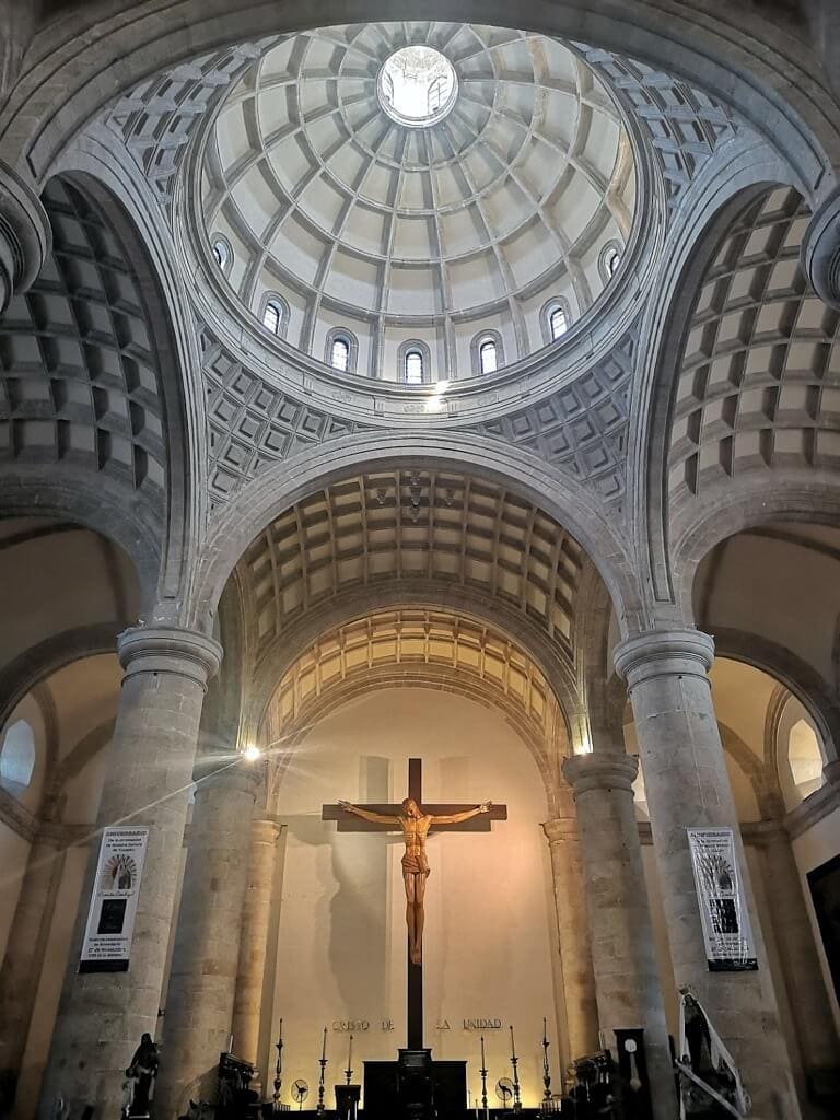 Cross and interior of the Merida Cathedral