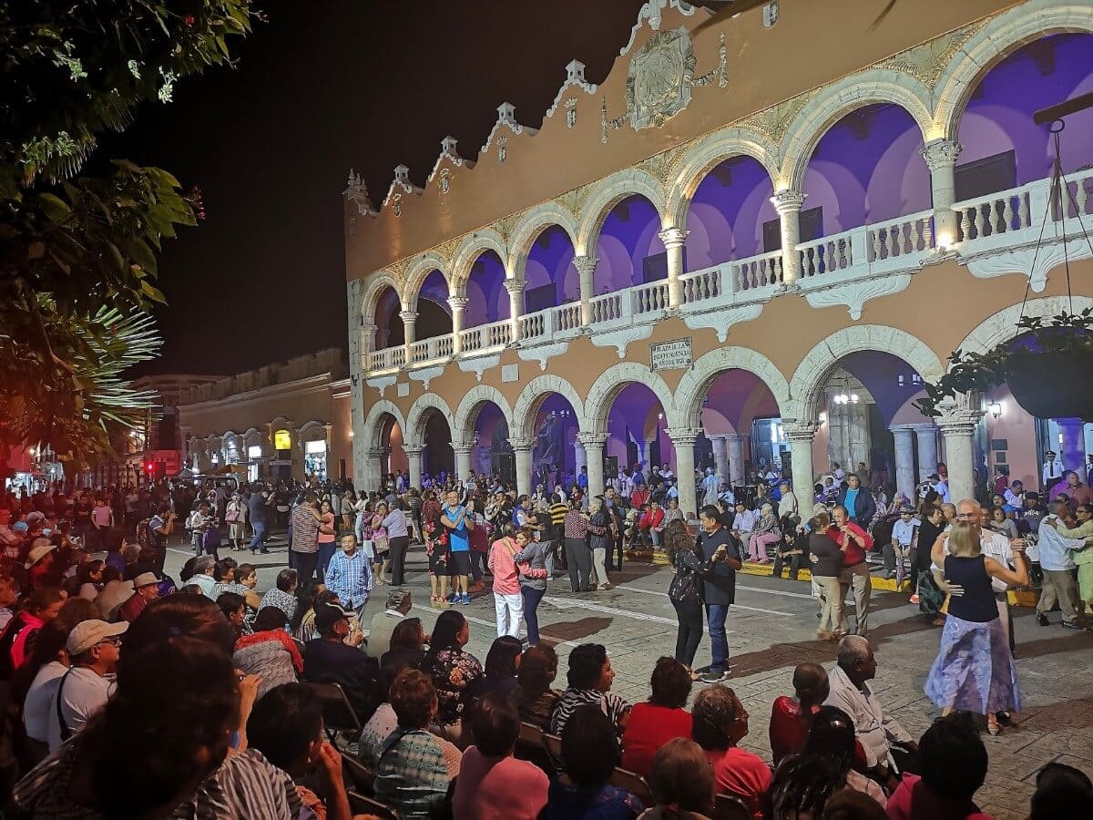 People dancing on weekly street festival in Merida