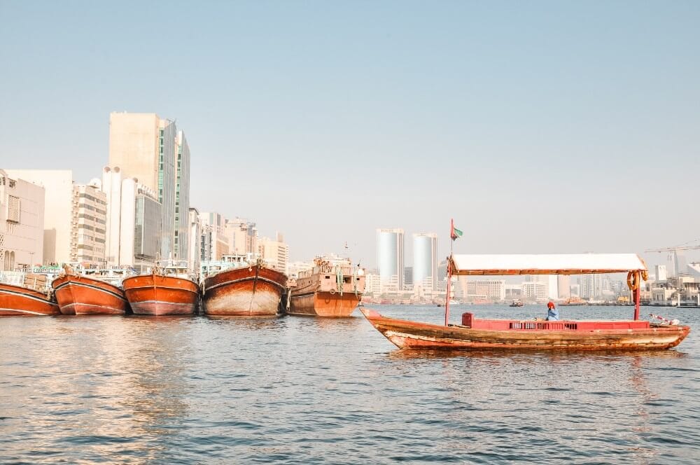 Crossing Cross Dubai Creek with Abra traditional arabic boat