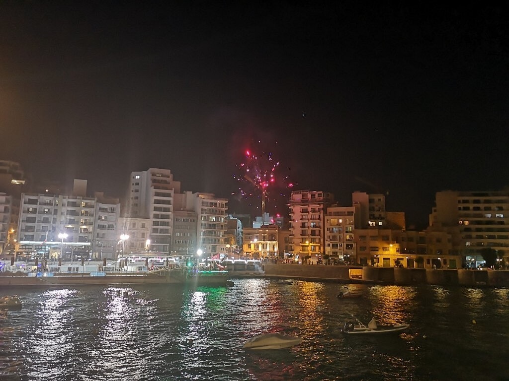 Fireworks in the bay of St Juliens in Malta