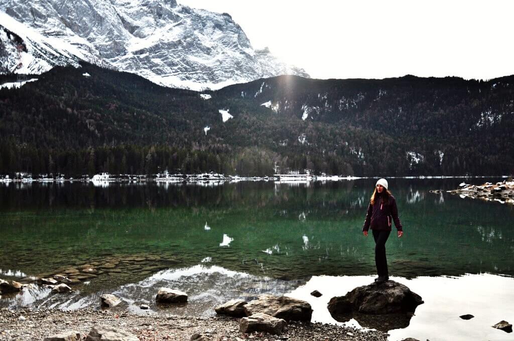 girl standing nesar the lake Eibsee