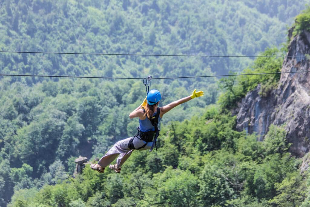 Zip lining at Yell Extreme Park