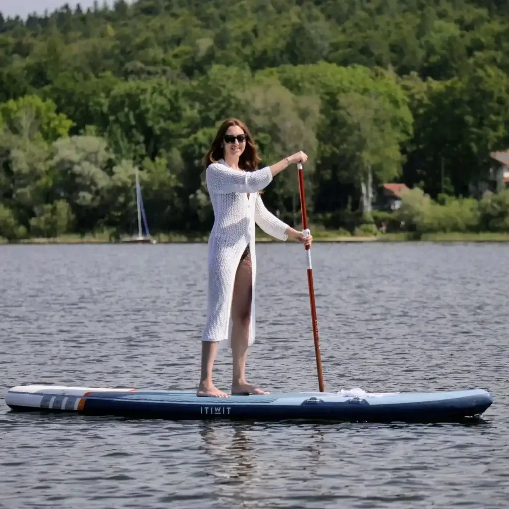 A girl standup paddling on lake Starnberg