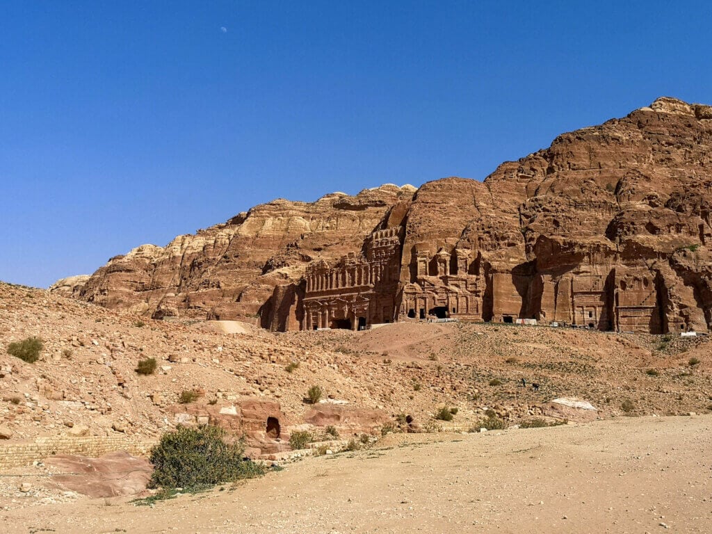 Ancient monuments carved on the cliff on the way to the Ad Deir Trail
