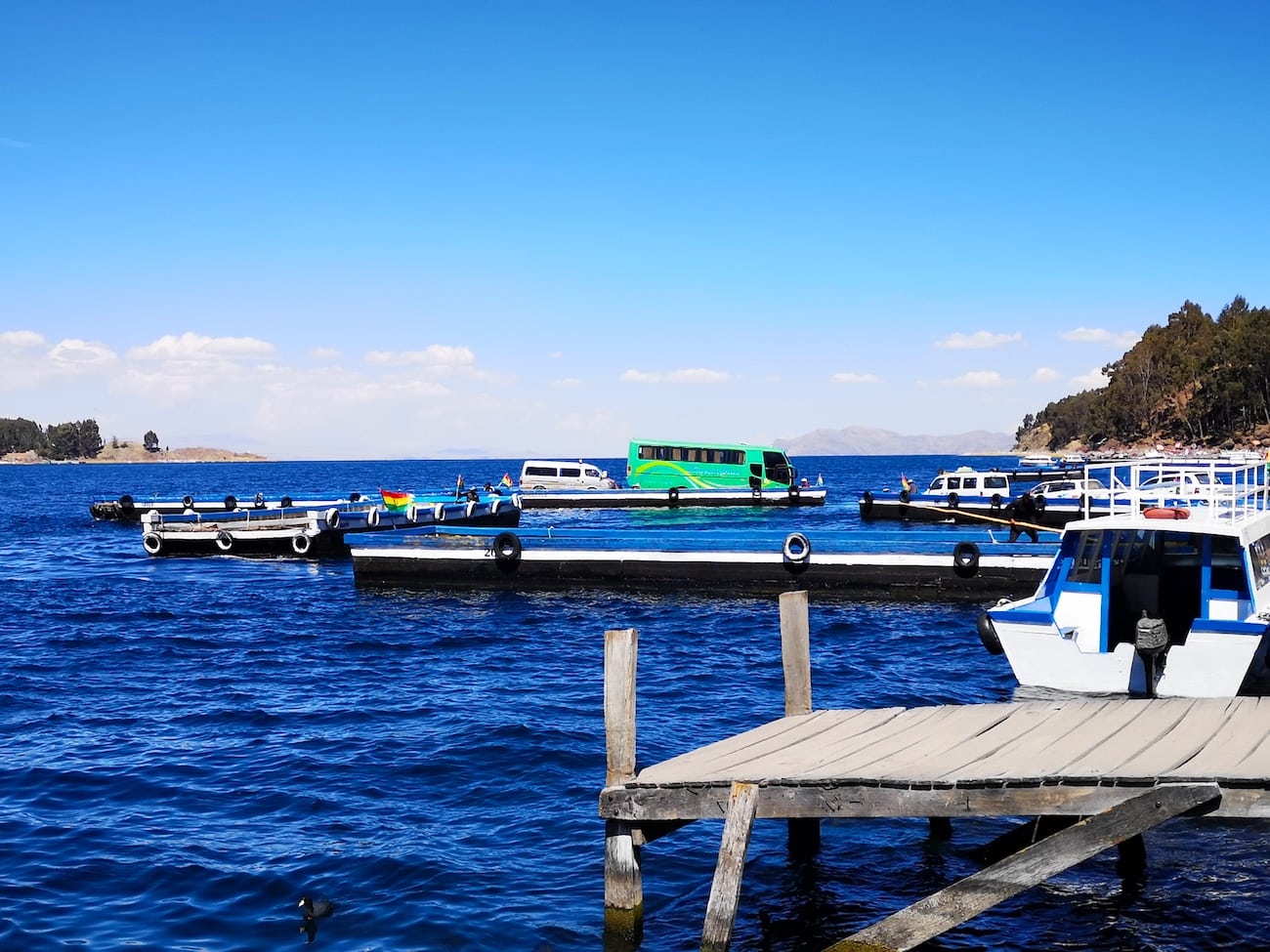 Bus crossing Lake Titicaca on a boat