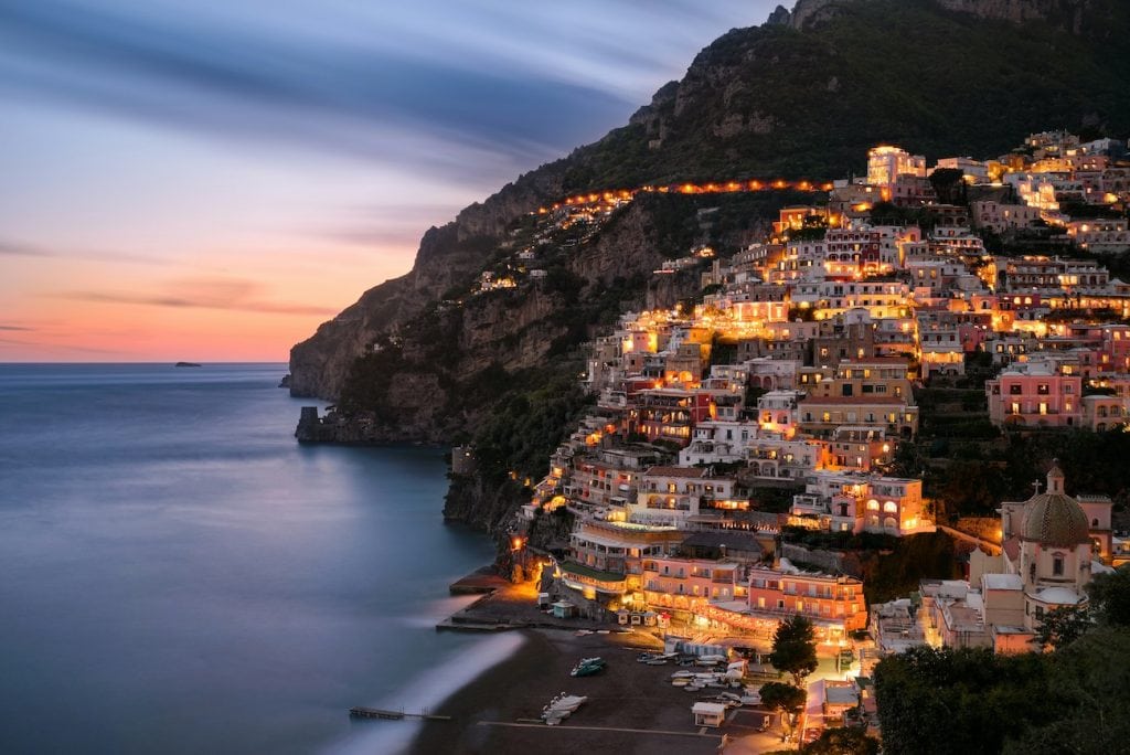 Panoramic view of Positano in sunset